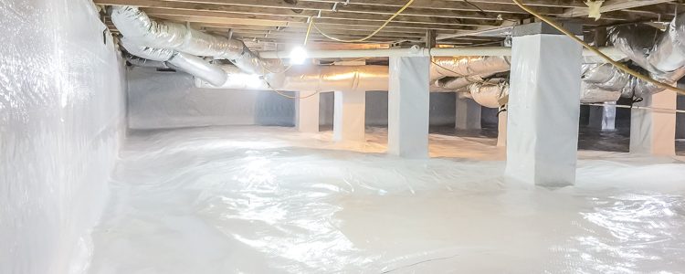 Clean, bright crawl space with white plastic covering the floor and pillars. Exposed wooden beams and ducts create an organized, tidy look.
